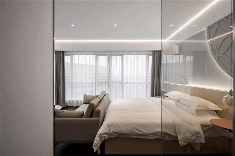 以通寶為主題的時尚精品酒店客房設計實景圖