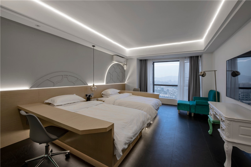 以通寶為主題的時尚精品酒店標準客房設計實景圖